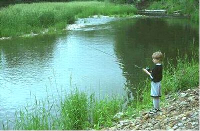Angler fishing the Genesee River at Riverside Park Campground
